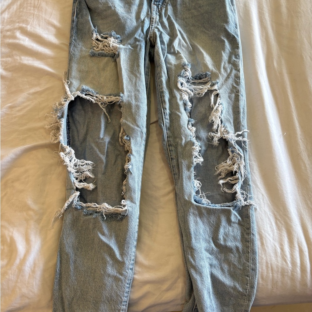 Distressed Light Blue Jeans